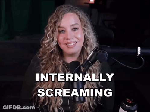 Woman In Front Of Microphone Internally Screaming GIF