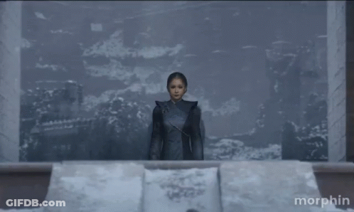 Woman In Front Of Morphin Wall GIF