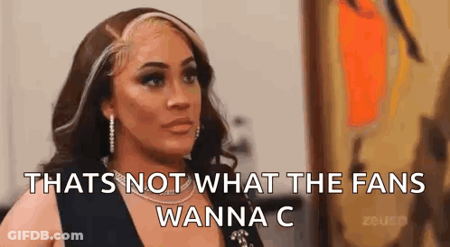 Woman In Front Of Painting Says That's Not What The Fans Wanna C GIF