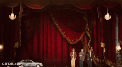 Woman In Front Of Red Curtain And Car GIF