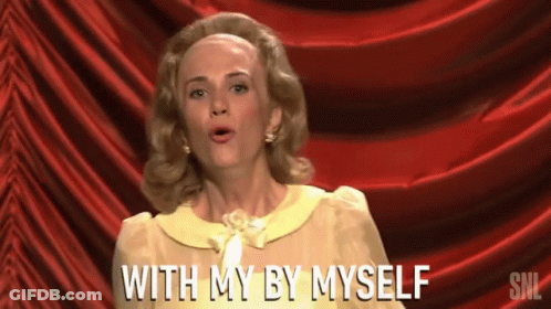 Woman In Front Of Red Curtain Saying With My By Myself GIF