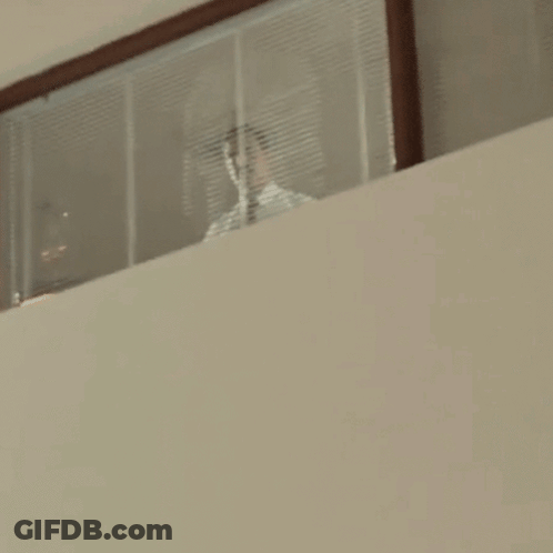 Woman In Front Of Rehab Center Wall GIF