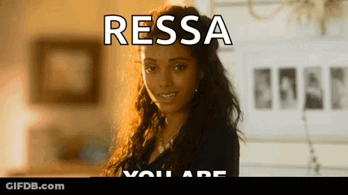 Woman In Front Of Ressa You Are Netflix Sign GIF