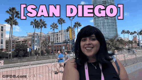 Woman In Front Of San Diego Sign GIF