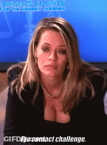 Woman In Front Of Screen Saying Angeles County GIF