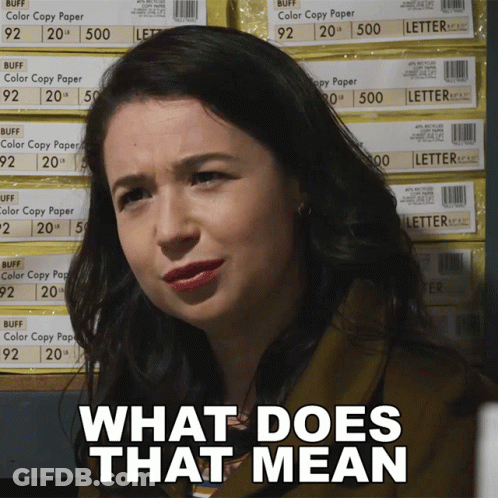 Woman In Front Of Stacks Of Buff Copy Paper GIF