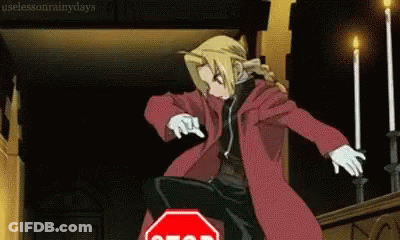 Woman In Front Of Stop Sign And Jangan Sign GIF