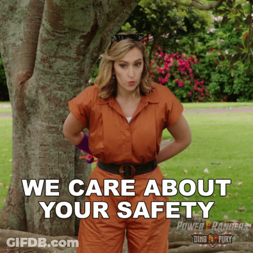 Woman In Front Of Tree With We Care About Your Safety GIF