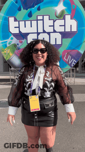 Woman In Front Of Twitch Con Live Sign GIF