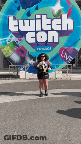 Woman In Front Of Twitch Con Sign GIF