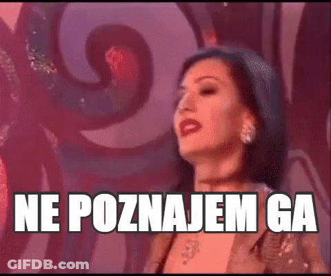 Woman In Front Of Wall Saying Ne Poznajem Ga GIF