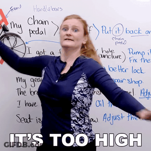 Woman In Front Of White Board Saying It's Too High GIF