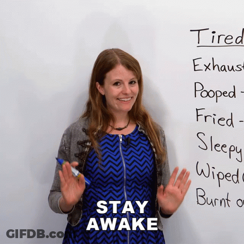 Woman In Front Of White Board Saying Stay Awake GIF