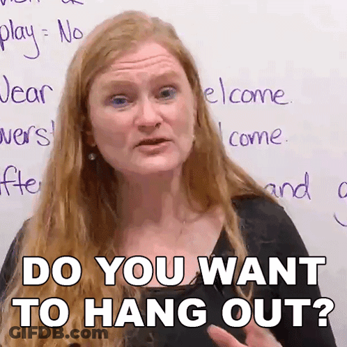 Woman In Front Of Whiteboard Says Do You Want To Hang Out GIF