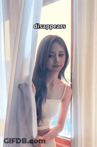 Woman In Front Of Window With Word Disappears GIF