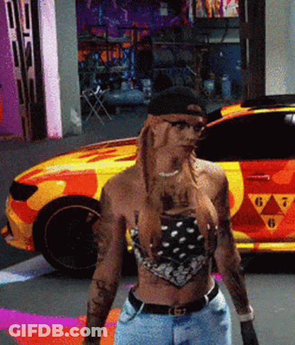 Woman In Front Of Yellow Car Number 6 GIF