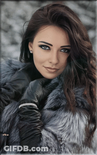 Woman In Fur Coat And Leather Gloves With Vira GIF