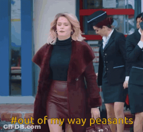 Woman In Fur Coat And Leather Skirt Says Out Of My Way Peasants GIF