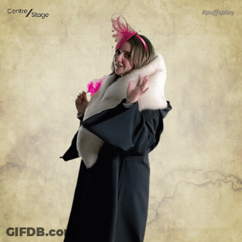 Woman In Fur Coat And Pink Headband GIF
