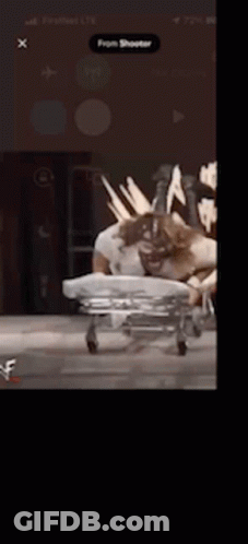 Woman In Fur Coat And Sunglasses Giving Middle Finger In Car GIF