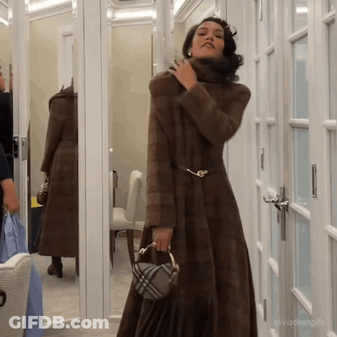 Woman In Fur Coat In Front Of Mirror Olivia Teengifs GIF