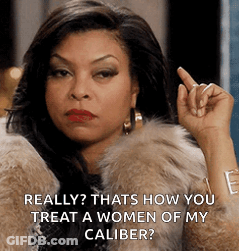 Woman In Fur Coat Pointing GIF
