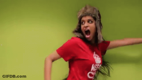 Woman In Fur Hat And Red Shirt Saying Keep Calm GIF