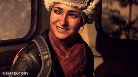 Woman In Fur Hat And Scarf Smiling GIF