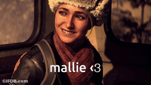 Woman In Fur Hat And Scarf Smiling With Mallie < 3 GIF