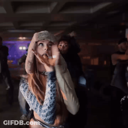 Woman In Furry Hat And Watch Dancing GIF