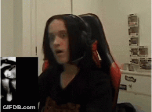 Woman In Gaming Chair Making Funny Face GIF