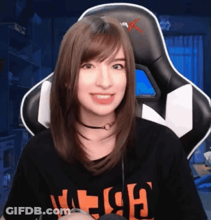 Woman In Gaming Chair Wearing Witch T-Shirt GIF