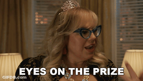 Woman In Glasses And Birthday Tiara Saying Eyes On The Prize GIF