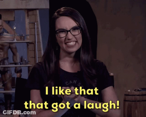 Woman In Glasses And Black Shirt Says I Like That That Got A Laugh GIF