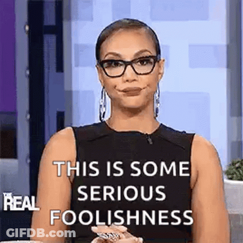 Woman In Glasses And Black Tank Top Making Funny Face GIF