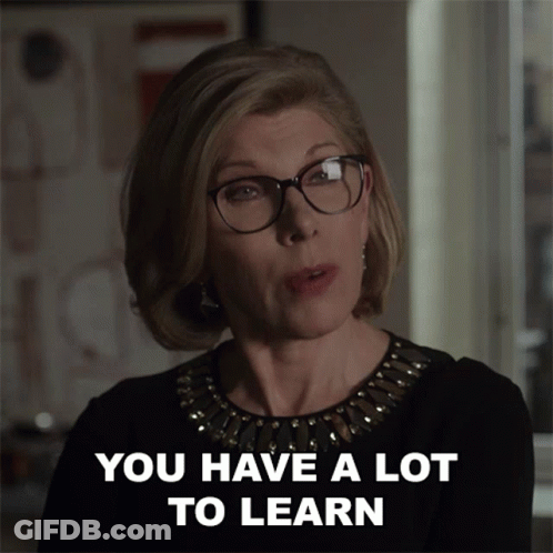 Woman In Glasses And Black Top Says You Have A Lot To Learn GIF