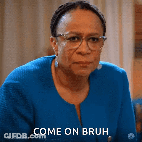 Woman In Glasses And Blue Jacket Making Funny Face Saying Come On Bruh GIF