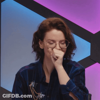 Woman In Glasses And Blue Shirt Covering Mouth GIF