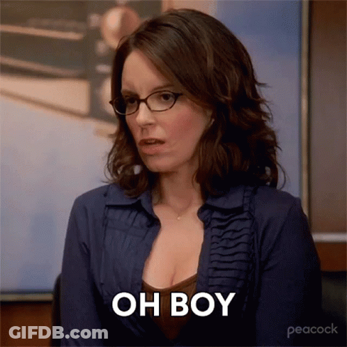 Woman In Glasses And Blue Shirt Saying Oh Boy GIF