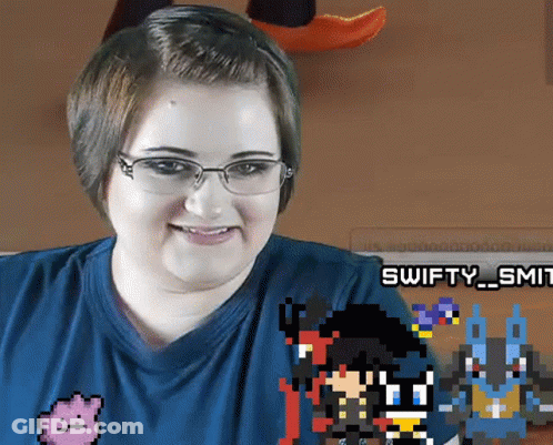 Woman In Glasses And Blue Shirt With Swifty_smit GIF