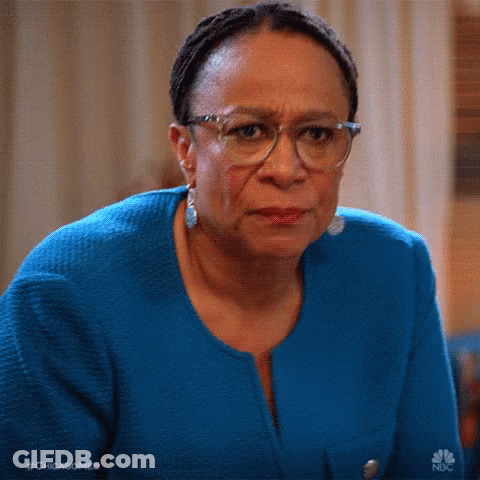 Woman In Glasses And Blue Sweater With #Chicagomed GIF