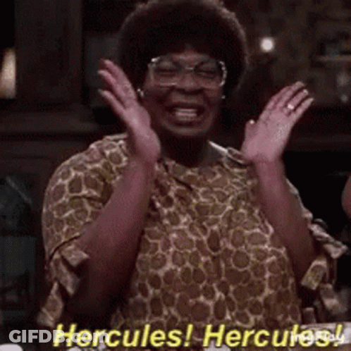 Woman In Glasses And Giraffe Print Shirt Laughing Hercules Hercules GIF