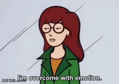 Woman In Glasses And Green Jacket Saying I'm Overcome With Emotion GIF