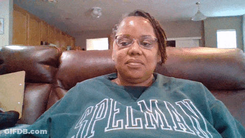 Woman In Glasses And Green Spellman Sweatshirt GIF