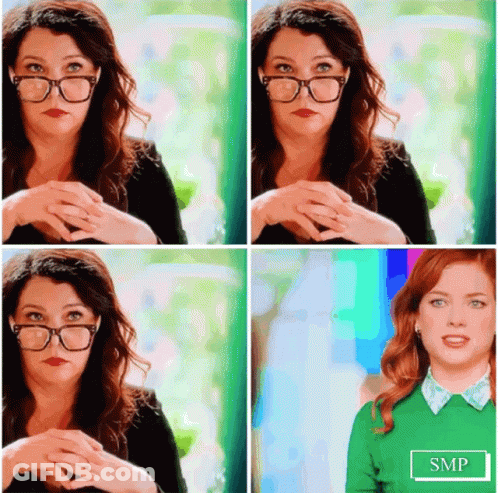 Woman In Glasses And Green Sweater With SMP GIF