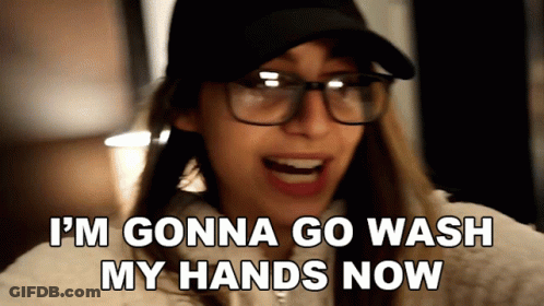Woman In Glasses And Hat Saying I'm Gonna Go Wash My Hands Now GIF