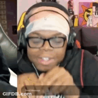Woman In Glasses And Headphones At Computer GIF