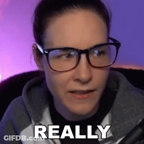 Woman In Glasses And Hoodie Saying Really GIF