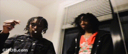 Woman In Glasses And Mask Looking In Mirror GIF