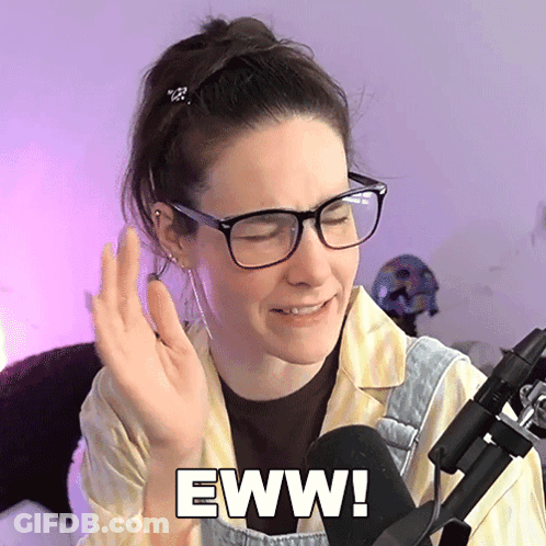 Woman In Glasses And Overalls Says Eww GIF